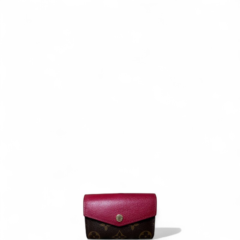 Louis Vuitton Sarah Multicartes Fuchsia  Wallet

Date Code:SP1137

Dimensions: 4 L X 3 H inches

In very good condition. Some scratching on the hardware.

Does not come with original dust bag or box.