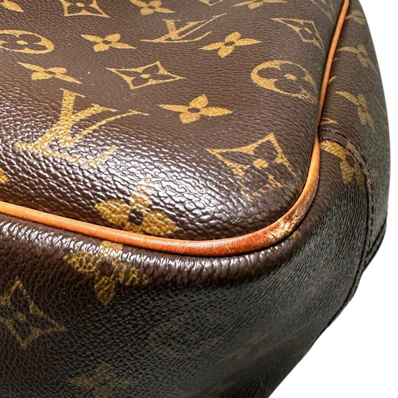 Louis Vuitton Deauville Monogram<br />
<br />
Dimensions:10.25 H x 13.75 L inches<br />
<br />
In very good condition. Some marks on the leather and some minor corner wear. Some interior marks.<br />
<br />
Does not come with original dust bag or box,