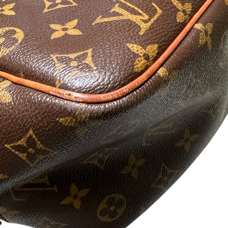 Louis Vuitton Deauville Monogram<br />
<br />
Dimensions:10.25 H x 13.75 L inches<br />
<br />
In very good condition. Some marks on the leather and some minor corner wear. Some interior marks.<br />
<br />
Does not come with original dust bag or box,