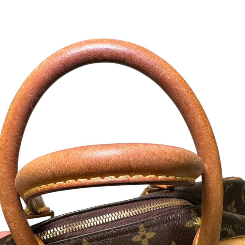 Louis Vuitton Deauville Monogram<br />
<br />
Dimensions:10.25 H x 13.75 L inches<br />
<br />
In very good condition. Some marks on the leather and some minor corner wear. Some interior marks.<br />
<br />
Does not come with original dust bag or box,