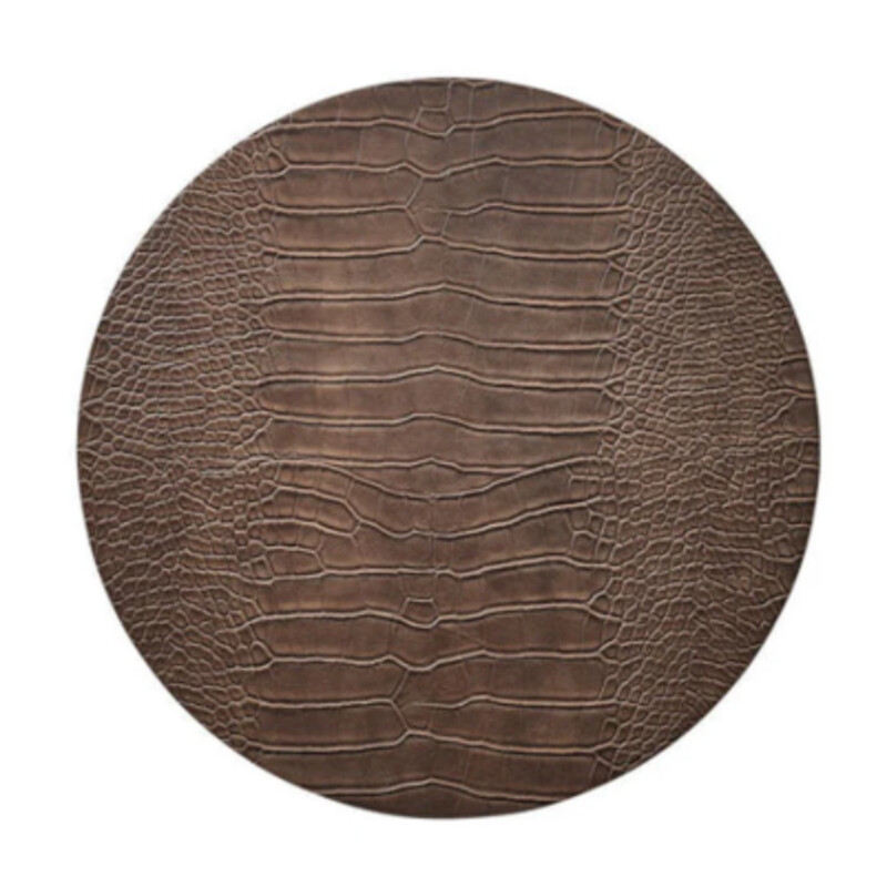 Kim Seybert Crocodile Placemat
Chocolate
Size: 15
Add sophisticated style to any table with the Croco Placemat. Crafted with an embossed faux crocodile print, this placemat is easy to clean and care for, making it perfect for any occasion. Enhance your table setting with the unmistakable luxury of Croco Placemat! Wipe Clean with Damp Cloth.
NEW Retail $39 Each
Coordinating Placemats Sold Separately