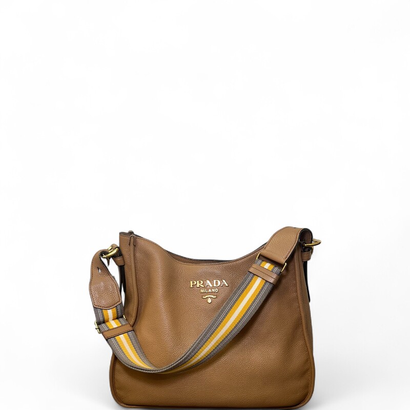 Prada Vitello Phenix Brown Hobo with Double Strap

Date Code: 158

Dimensions: 12 L x 13 H inches

In very good condition. Some discoloration of hardware. Some corner wear and some wear to the strap.

Come with original dust bag. No box.