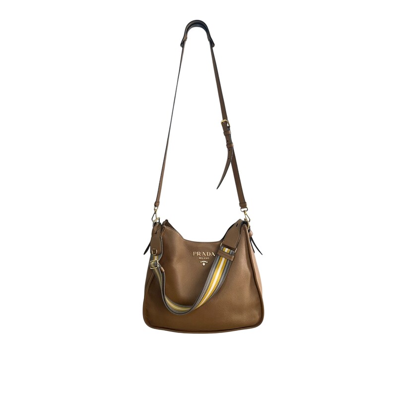 Prada Vitello Phenix Brown Hobo with Double Strap<br />
<br />
Date Code: 158<br />
<br />
Dimensions: 12 L x 13 H inches<br />
<br />
In very good condition. Some discoloration of hardware. Some corner wear and some wear to the strap.<br />
<br />
Come with original dust bag. No box.