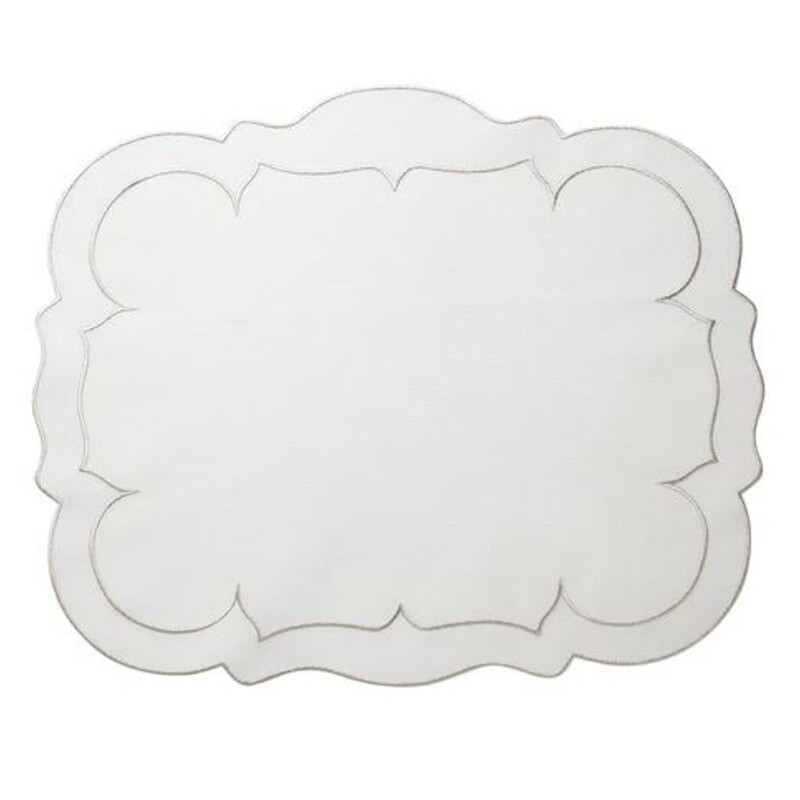 Skyros Scalloped Mats
Cream Linen with Silver Trim
Size: 19x15
Set of 4
NEW Retail $140+
These exquisite mats are Made in Portugal of 100% pure linen and treated with a light acrylic coating. Caring for the Linho Collection mats is quite easy. Simply wipe a spill clean with a damp cloth! It’s just that effortless, as the mats are extremely stain resistant. Linho mats are designed to add a beautiful monogram, either at the top or center, but are just as exquisite without one.

Coordinating Mats Sold Separately
