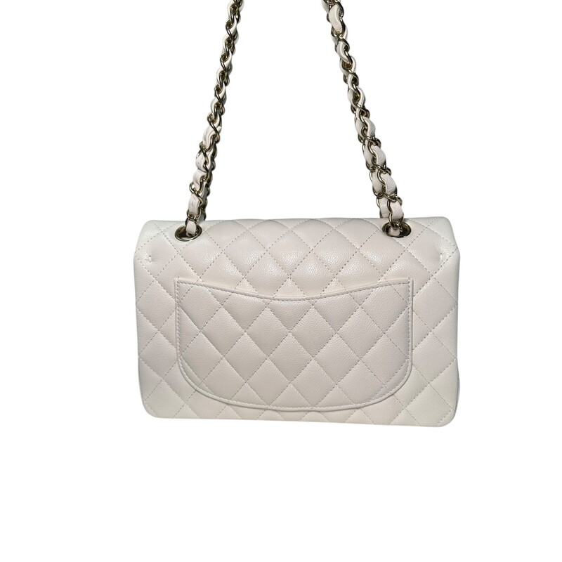 Chanel Double Flap White Veau Leather Chain Bag<br />
<br />
Serial Code TEK*****<br />
<br />
Dimensions: 9 L x 5.7 H inches<br />
<br />
In excellent condition. Like New.<br />
<br />
Comes with the original dust bag and box.