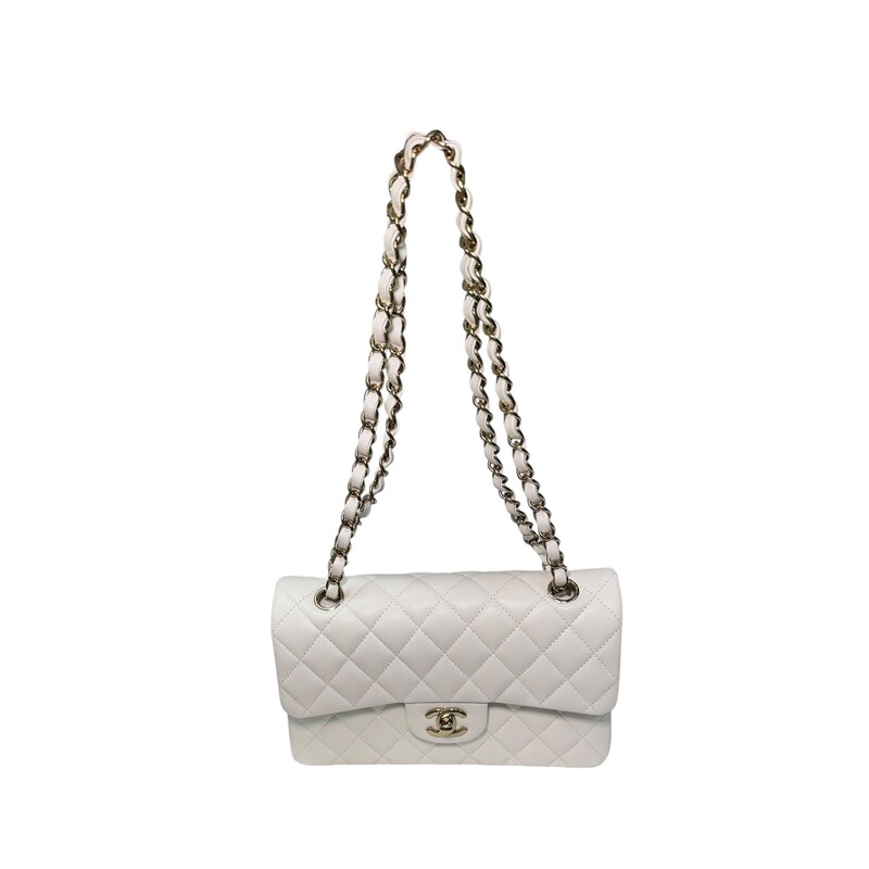 Chanel Double Flap White Veau Leather Chain Bag<br />
<br />
Serial Code TEK*****<br />
<br />
Dimensions: 9 L x 5.7 H inches<br />
<br />
In excellent condition. Like New.<br />
<br />
Comes with the original dust bag and box.