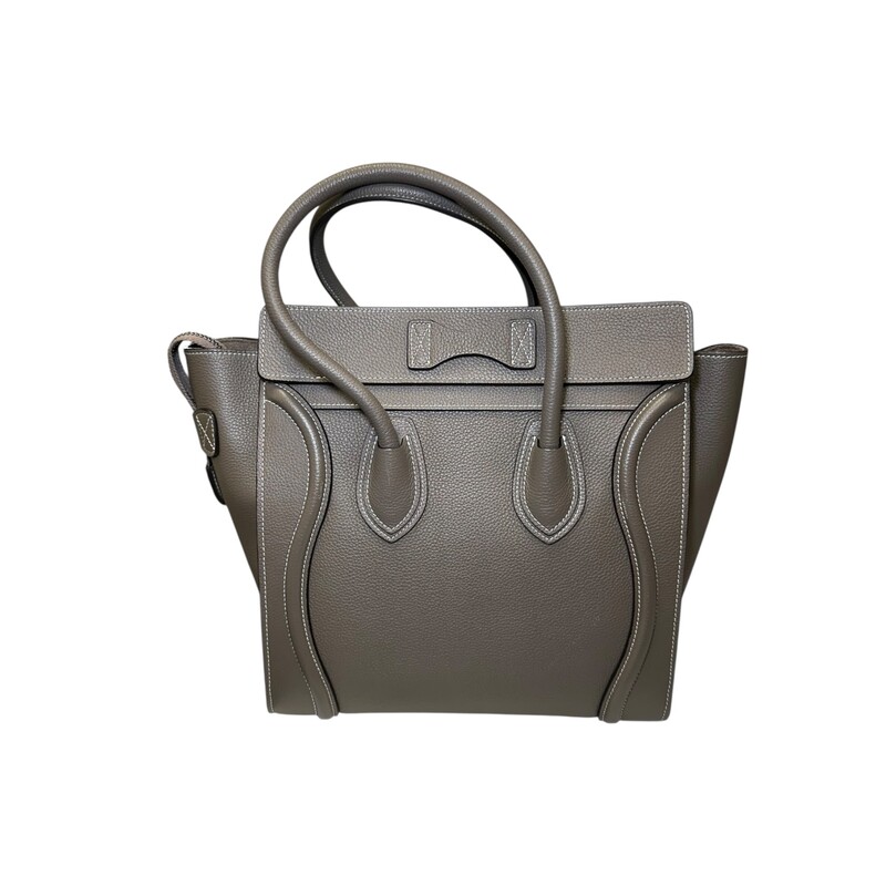 Celine Micro Luggage Tote<br />
<br />
Serial Code: SAT 0117<br />
<br />
Dimensions:<br />
Base length: 11 in<br />
Height: 11 in<br />
Width: 6 in<br />
Drop: 4.75 in<br />
<br />
In very good condition. Minor corner wear. Top handle deformation from improper storage.<br />
<br />
Comes with the original dust bag. No box.