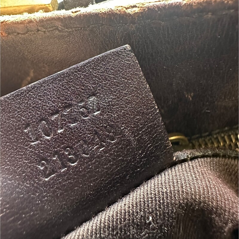 Gucci Canvas Belt  Monogram Tote<br />
<br />
Style Code: 107757 213048<br />
<br />
Dimensions: 12L X 10.5H X 4W<br />
<br />
In very good condition. Scratches on the leather.<br />
<br />
Does not come with original dust bag or box