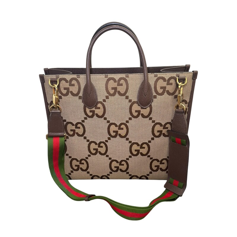 Gucci Jumbo GG Canvas Tote With Removable Strap<br />
<br />
Style Code: 678839.520981<br />
<br />
Dimensions: 15 L X 13 H inches<br />
<br />
In very good condition. Some corner wear, some minor wear on the handles and marks inside the interior.<br />
<br />
Does not come with original dust bag or box.