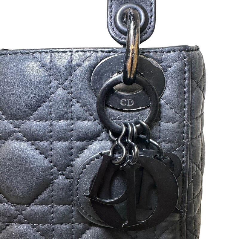 Dior Lady Dior Black Ultramatte Cannage Calfskin Mini

Serial Code:15- BO-1119

Dimensions: 6.5 L  x 6 H  x 3 W inches

In good condition. Wear and fading of the hardware throuhgout the bag. Interior marks and stains.

Comes with the original dust bag. No Box.