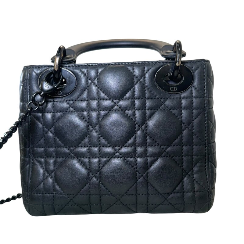 Dior Lady Dior Black Ultramatte Cannage Calfskin Mini<br />
<br />
Serial Code:15- BO-1119<br />
<br />
Dimensions: 6.5 L  x 6 H  x 3 W inches<br />
<br />
In good condition. Wear and fading of the hardware throuhgout the bag. Interior marks and stains.<br />
<br />
Comes with the original dust bag. No Box.