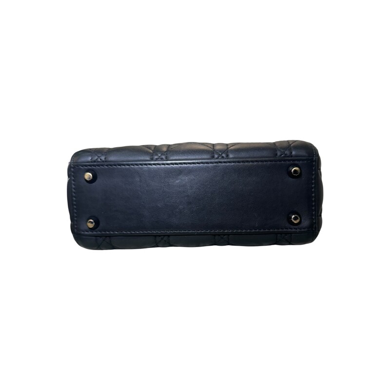 Dior Lady Dior Black Ultramatte Cannage Calfskin Mini<br />
<br />
Serial Code:15- BO-1119<br />
<br />
Dimensions: 6.5 L  x 6 H  x 3 W inches<br />
<br />
In good condition. Wear and fading of the hardware throuhgout the bag. Interior marks and stains.<br />
<br />
Comes with the original dust bag. No Box.