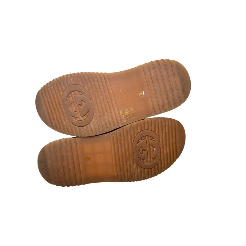 Gucci Angelina Platform Monogram Slides<br />
<br />
Style Code:573018 09 B<br />
<br />
In very good condition. Some minor marks on bottoms.<br />
<br />
Comes with the original box and dust bag.