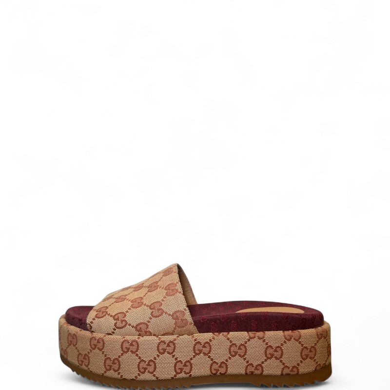 Gucci Angelina Platform Monogram Slides

Style Code:573018 09 B

In very good condition. Some minor marks on bottoms.

Comes with the original box and dust bag.