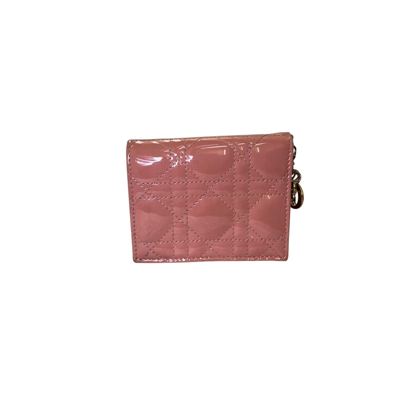 Dior Lady Dior Gardenia Patent Leather Compact Wallet<br />
<br />
Serial Code:43-MA0198<br />
<br />
Dimensions:4 L x 3 H inches<br />
<br />
In very good condition. Some light wear on the hardware.
