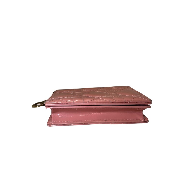 Dior Lady Dior Gardenia Patent Leather Compact Wallet<br />
<br />
Serial Code:43-MA0198<br />
<br />
Dimensions:4 L x 3 H inches<br />
<br />
In very good condition. Some light wear on the hardware.