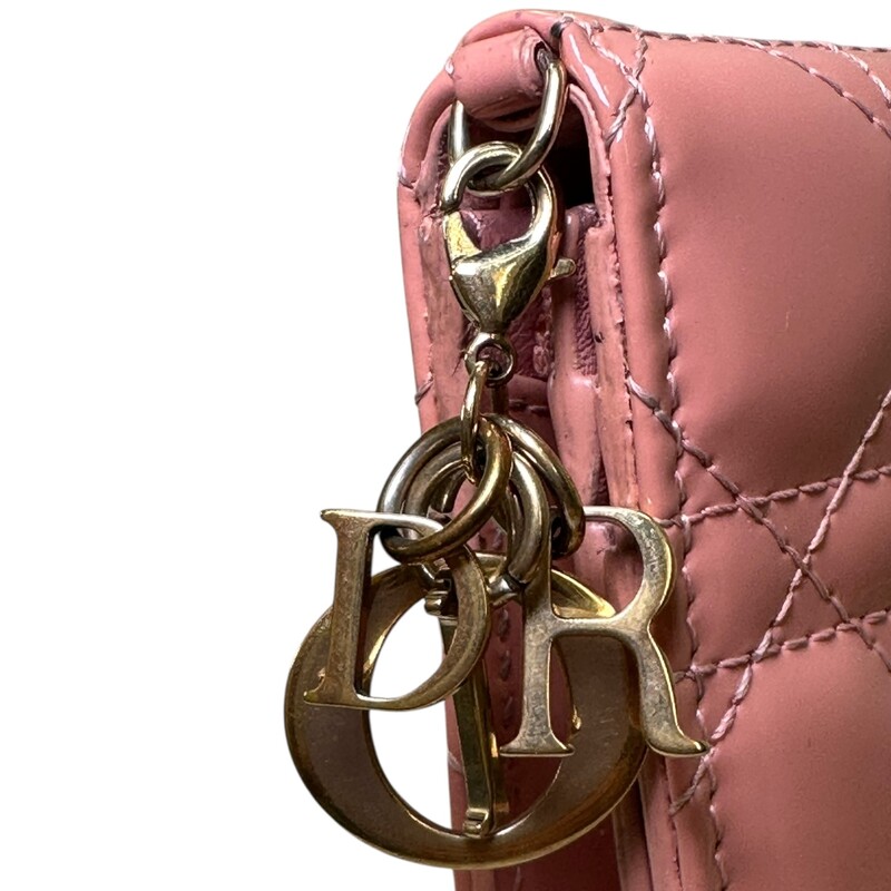 Dior Lady Dior Gardenia Patent Leather Compact Wallet<br />
<br />
Serial Code:43-MA0198<br />
<br />
Dimensions:4 L x 3 H inches<br />
<br />
In very good condition. Some light wear on the hardware.