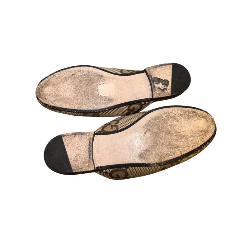 Gucci Princeton Horsebit Monogram Loafer Slides<br />
<br />
Size: 35.5<br />
<br />
Code: 475094<br />
<br />
In very good condition.  Wear to the bottom soles. Light creasing to the upper material.<br />
<br />
Does not come with the original dust bag or box.