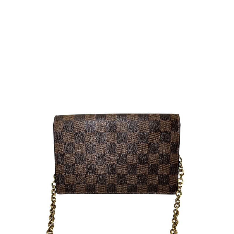 Louis Vuitton Vavin Wallet On A Chain<br />
<br />
Date Code: CA422O<br />
<br />
Dimensions: 8L X 5 H inches<br />
<br />
In good condition. Some tranishing and scratches on the hardware.<br />
<br />
Does not come with the orignial dust bag or box.