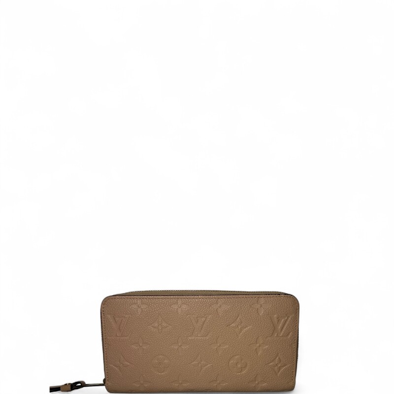 Louis Vutiton Empriente Beige Zippy Wallet

Date Code: Sp 1135

Dimensions: 7 L x 5 H inches

In excellent condition. Like new.