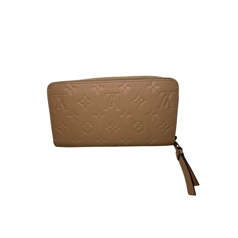 Louis Vutiton Empriente Beige Zippy Wallet<br />
<br />
Date Code: Sp 1135<br />
<br />
Dimensions: 7 L x 5 H inches<br />
<br />
In excellent condition. Like new.
