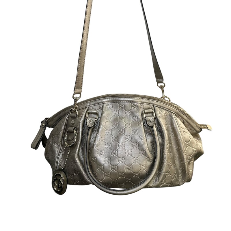 Gucci GG Gold Sukey Tote with Crossbody Strap<br />
<br />
Style Code: 223974 525040<br />
<br />
Dimensions:14W x 11.5H x 5D<br />
<br />
In very good condition. Some minor marks on the leather and s  very minor mark inside the interior.<br />
<br />
Does not come wit h original dustr bag or box.