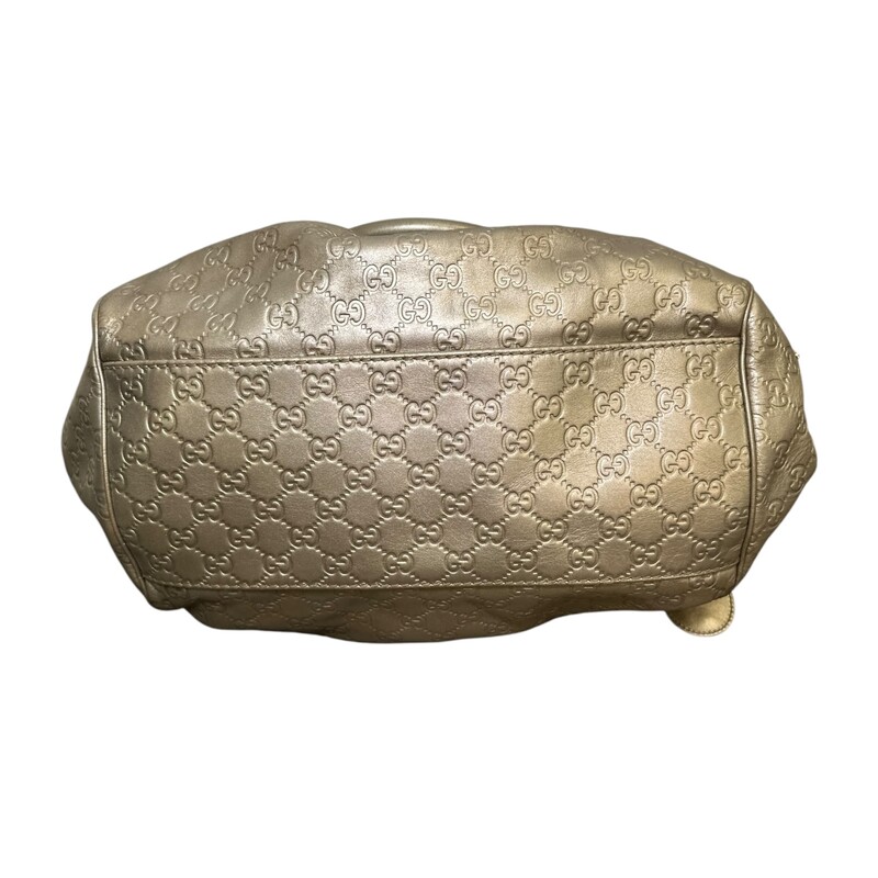 Gucci GG Gold Sukey Tote with Crossbody Strap<br />
<br />
Style Code: 223974 525040<br />
<br />
Dimensions:14W x 11.5H x 5D<br />
<br />
In very good condition. Some minor marks on the leather and s  very minor mark inside the interior.<br />
<br />
Does not come wit h original dustr bag or box.