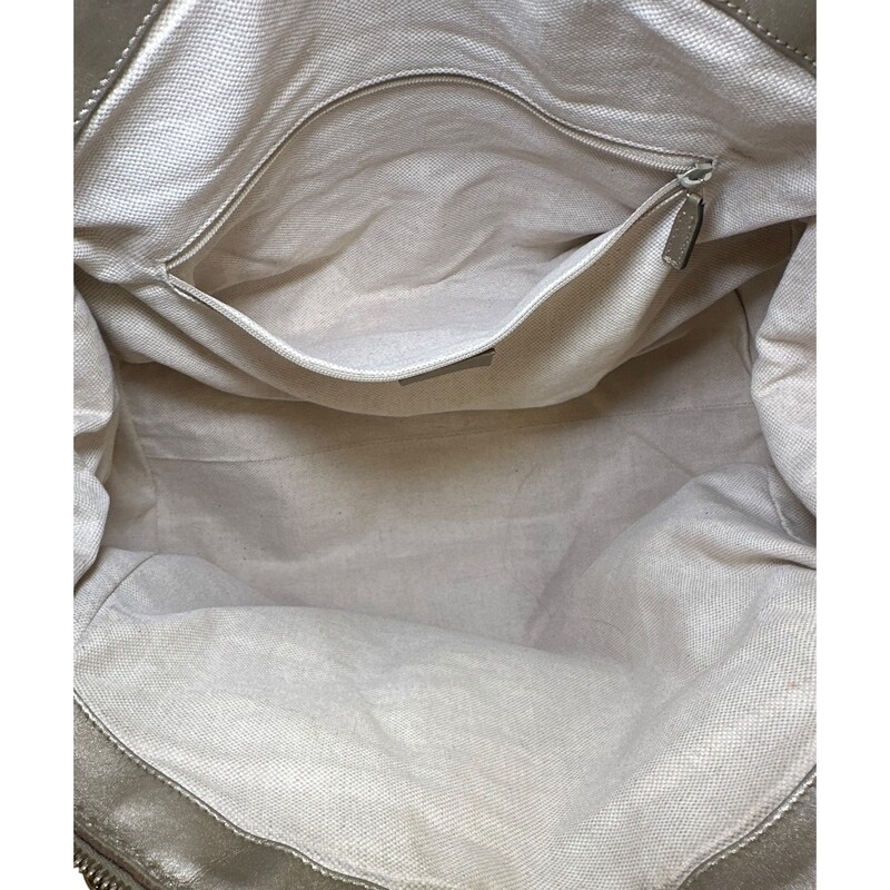 Gucci GG Gold Sukey Tote with Crossbody Strap<br />
<br />
Style Code: 223974 525040<br />
<br />
Dimensions:14W x 11.5H x 5D<br />
<br />
In very good condition. Some minor marks on the leather and s  very minor mark inside the interior.<br />
<br />
Does not come wit h original dustr bag or box.