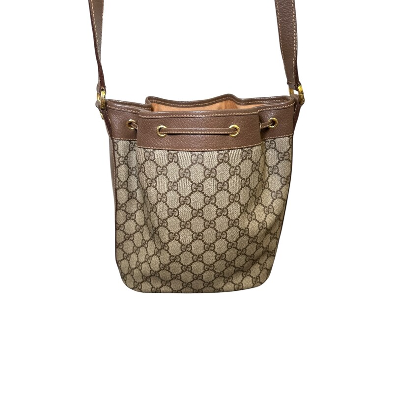 Gucci  Monogram Coated Canvas and leather Bucket Bag<br />
<br />
Style Code: 001.115.6179.4023<br />
<br />
Dimensions: 9 L X 9 H inches<br />
<br />
In very good condition.  Some fading of the interior.<br />
<br />
Does not come wit h original dustr bag or box.
