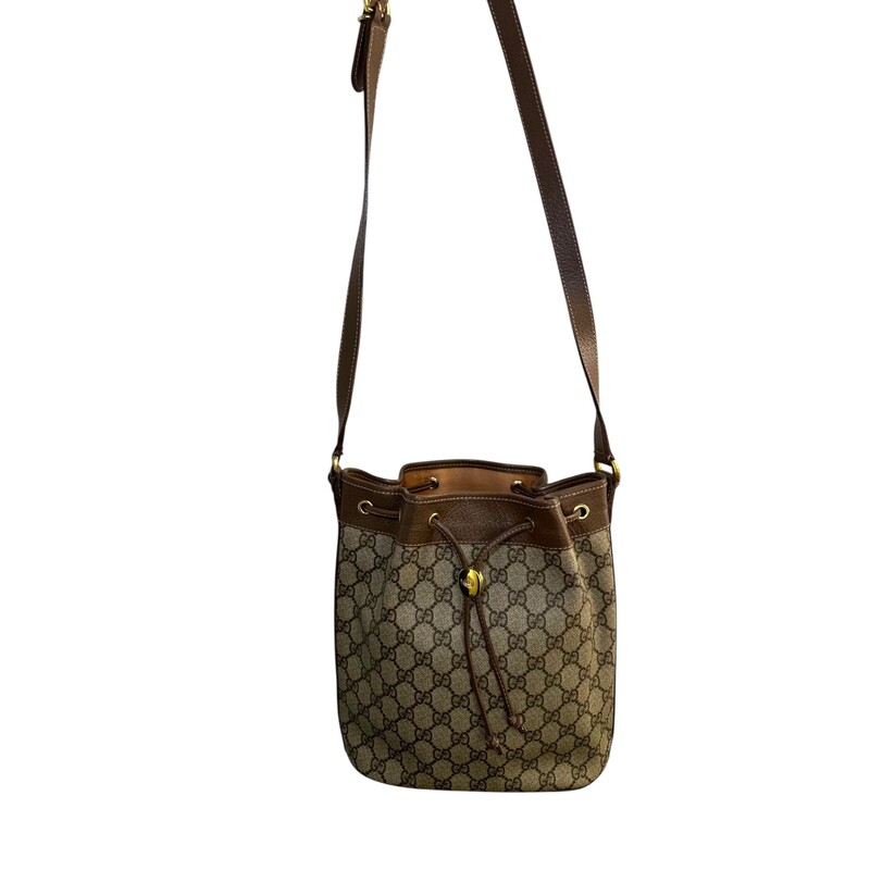 Gucci  Monogram Coated Canvas and leather Bucket Bag

Style Code: 001.115.6179.4023

Dimensions: 9 L X 9 H inches

In very good condition.  Some fading of the interior.

Does not come wit h original dustr bag or box.