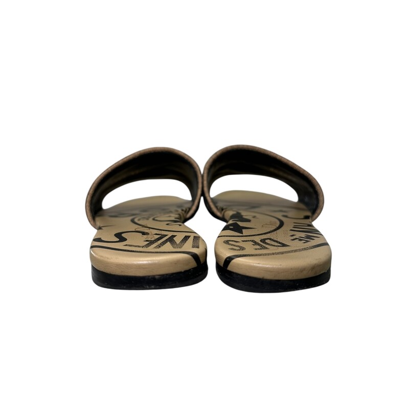 Dior Dway Slide Tan<br />
<br />
Size: 37<br />
<br />
Code: MD0422<br />
<br />
In good condition. Major wear to the leather on the front of the toes. Wear to the soles interior and exterior.<br />
<br />
Comes with the original dust bag and box.