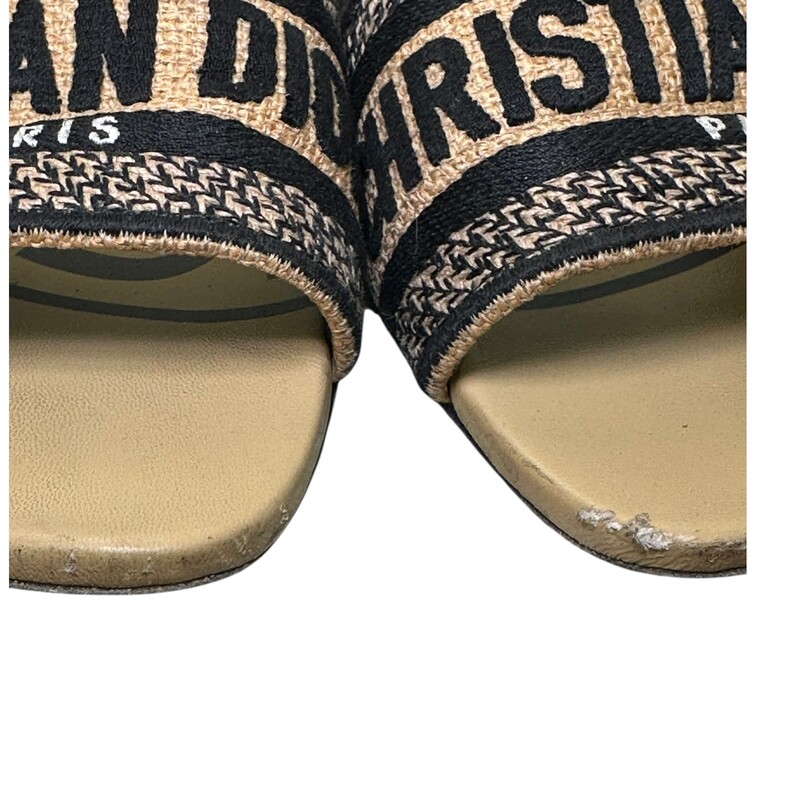Dior Dway Slide Tan<br />
<br />
Size: 37<br />
<br />
Code: MD0422<br />
<br />
In good condition. Major wear to the leather on the front of the toes. Wear to the soles interior and exterior.<br />
<br />
Comes with the original dust bag and box.