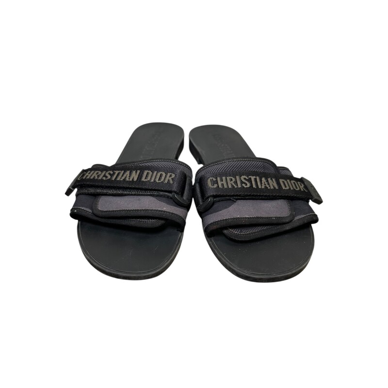 Dior Revolution Slides Black<br />
<br />
Size 41<br />
<br />
Code: M 0621<br />
<br />
In very good condition. Light wear to the fabric and the front and back sole.<br />
<br />
Does not come with the original dust bag or box.