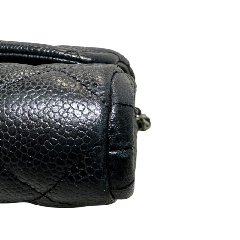 Chanel Cavair Clutch Chain Black Handbag<br />
<br />
Date Code: 1890****<br />
<br />
Dimensions<br />
Length: 11.25 in<br />
Height: 7 in<br />
Width: 1.75 in<br />
Drop: 9 in<br />
<br />
In very  condition. Minor scratching on the hardware, minor corner wear  and minor marks inside the interior.<br />
<br />
Comes with the original dut bag. No box