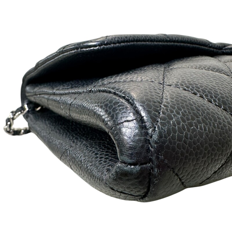 Chanel Cavair Clutch Chain Black Handbag<br />
<br />
Date Code: 1890****<br />
<br />
Dimensions<br />
Length: 11.25 in<br />
Height: 7 in<br />
Width: 1.75 in<br />
Drop: 9 in<br />
<br />
In very  condition. Minor scratching on the hardware, minor corner wear  and minor marks inside the interior.<br />
<br />
Comes with the original dut bag. No box