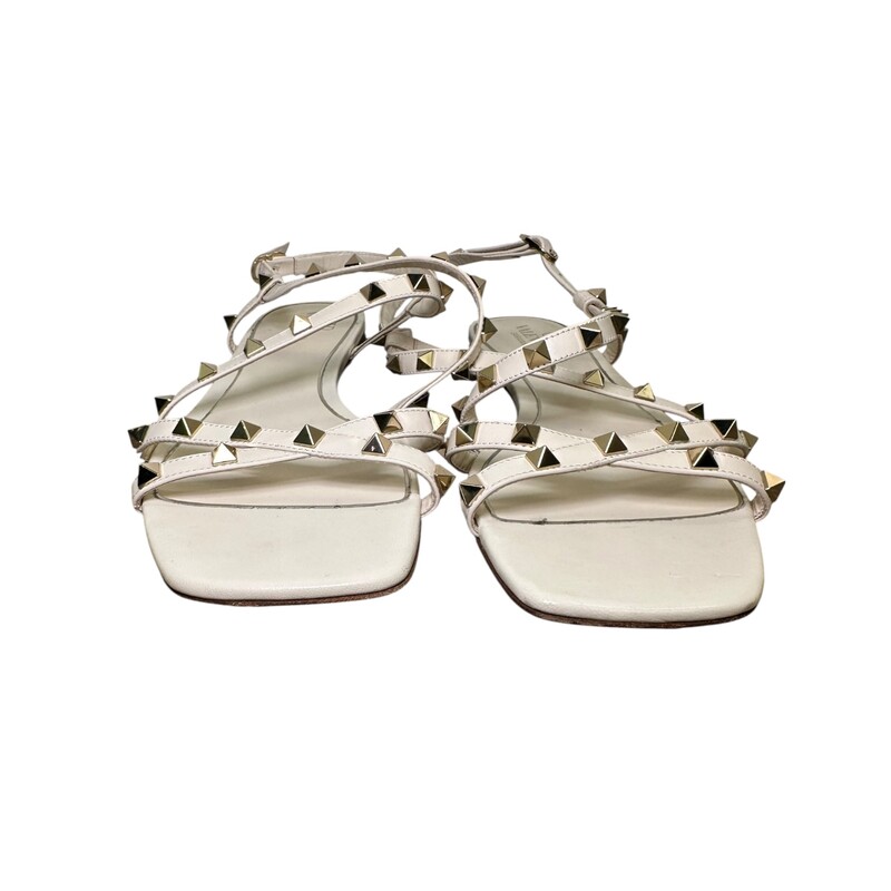 Valentino Rockstud Calfskin Leather Sandals with straps<br />
<br />
Size : 40.5<br />
<br />
Serial Code : D5 HR8 2<br />
<br />
In very good condition. Small cut in the leather.<br />
<br />
Does not come with original dust bag or box.