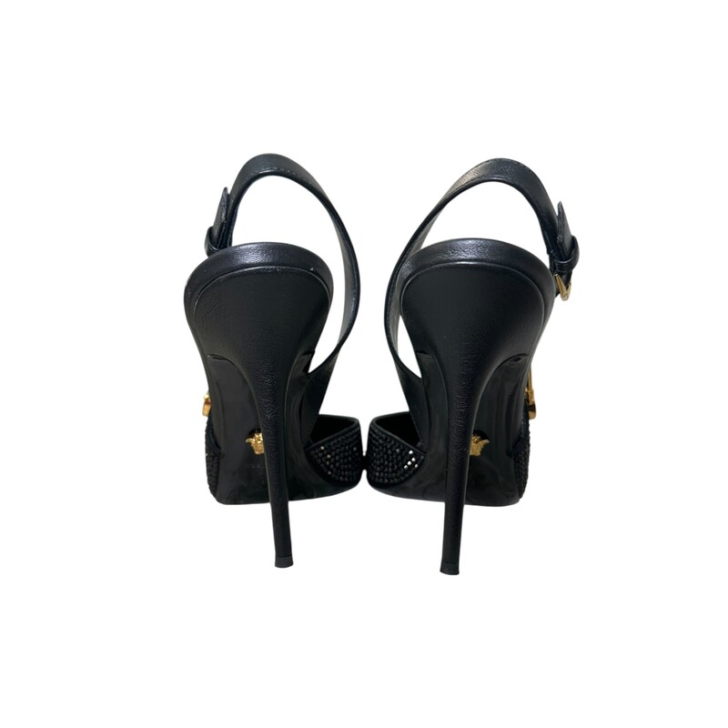 Versace Safety Pin Crystal Black Heels<br />
<br />
Size: 39<br />
<br />
In very good condition. Light wear to the bottom of the<br />
<br />
Comes with the original dust bag and box.