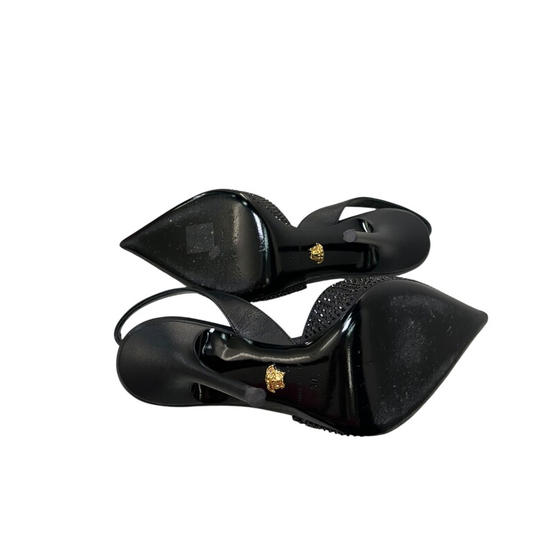 Versace Safety Pin Crystal Black Heels<br />
<br />
Size: 39<br />
<br />
In very good condition. Light wear to the bottom of the<br />
<br />
Comes with the original dust bag and box.