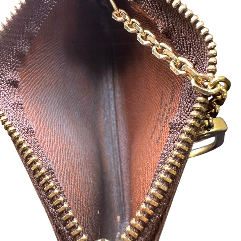 Louis Vuitton Monogram Key Pouch<br />
<br />
Dimensions: 5.9  L x3.3 H inches<br />
<br />
In good condition. Light scratching and tarnishing of<br />
hardware.<br />
<br />
Does not come with original dust bag or box.