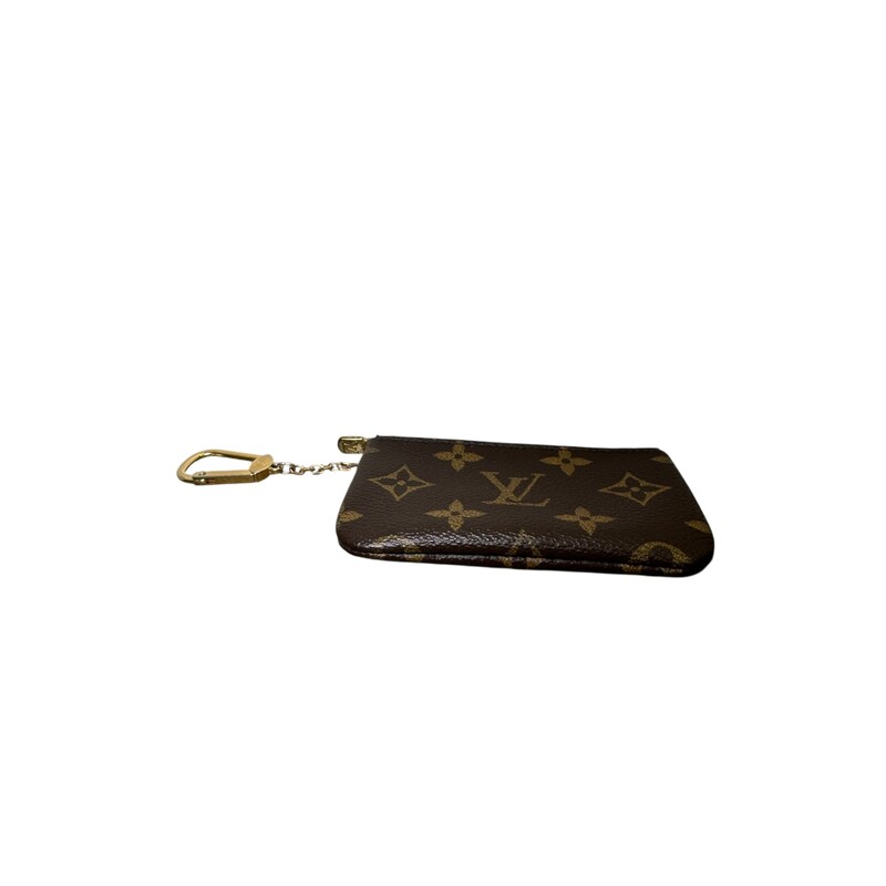 Louis Vuitton Monogram Key Pouch<br />
<br />
Dimensions: 5.9  L x3.3 H inches<br />
<br />
In good condition. Light scratching and tarnishing of<br />
hardware.<br />
<br />
Does not come with original dust bag or box.