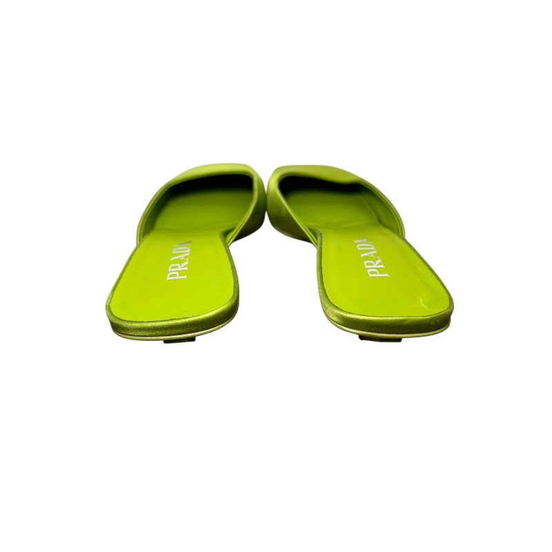 Prada Satin Mules 35mm Green<br />
<br />
Size: 37<br />
<br />
In very good condition. Light scuffs satin and bottom soles.<br />
<br />
Does not come with the original dus tbag or box.