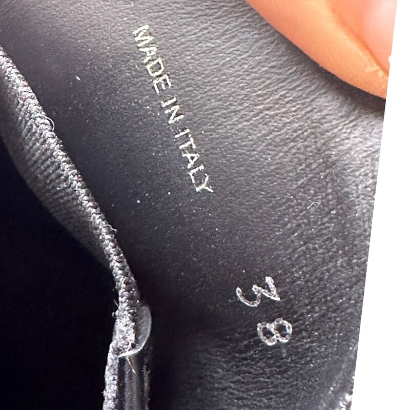 Prada Spazzolato Metal Triangle Black Loafer<br />
<br />
Size 38<br />
<br />
In excellent condition.<br />
<br />
Comes with original box.