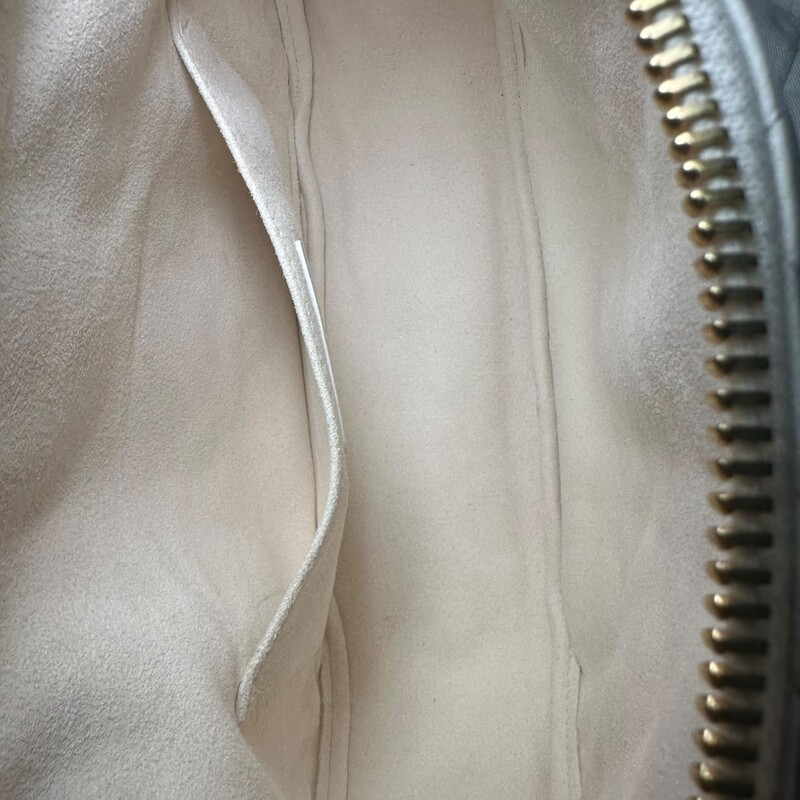 Christian Dior Lambskin Cannage Medium Dior Vibe Hobo Bag White<br />
<br />
Code: 28-MA-0291<br />
<br />
Dimensions:<br />
Longest length: 11 in<br />
Height: 7.25 in<br />
Width: 3.25 in<br />
Drop: 3.5 in<br />
Drop: 12 in<br />
<br />
In very good condition. Light marks throughout the bag.<br />
<br />
Comes with the original dust bag. No box.