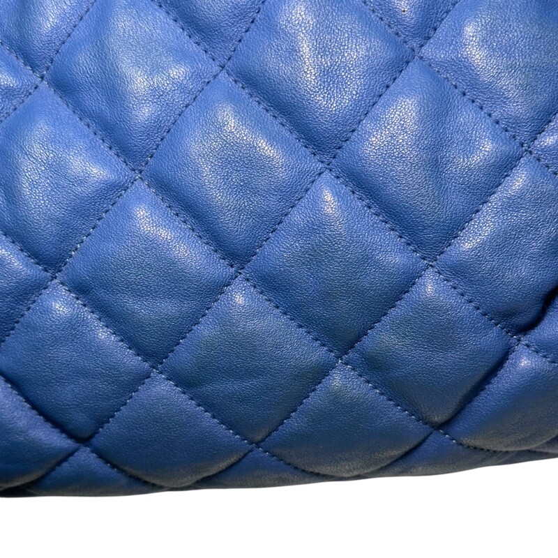 Chanel Around Hobo Quilted Chain  Washed Lambskin<br />
<br />
Serial Code:15xxxxxx<br />
<br />
Dimensions: 10 L x 9 H inches<br />
<br />
In fair condition. Some color discolration on the back of the bag. Minor interior marks. Hardware scratches.<br />
<br />
Does not come with original dust bag or box.