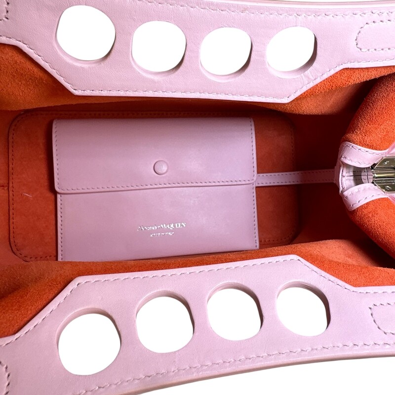 Alexander McQueen Peak Curve New Pink Mini<br />
<br />
Dimensions:<br />
Base length: 6.75 in<br />
Height: 5.75 in<br />
Width: 3.50 in<br />
Drop: 17.75 in<br />
<br />
In very good condition. Light scratch on the back of the bag.<br />
<br />
Comes with the original dust bag. No box.