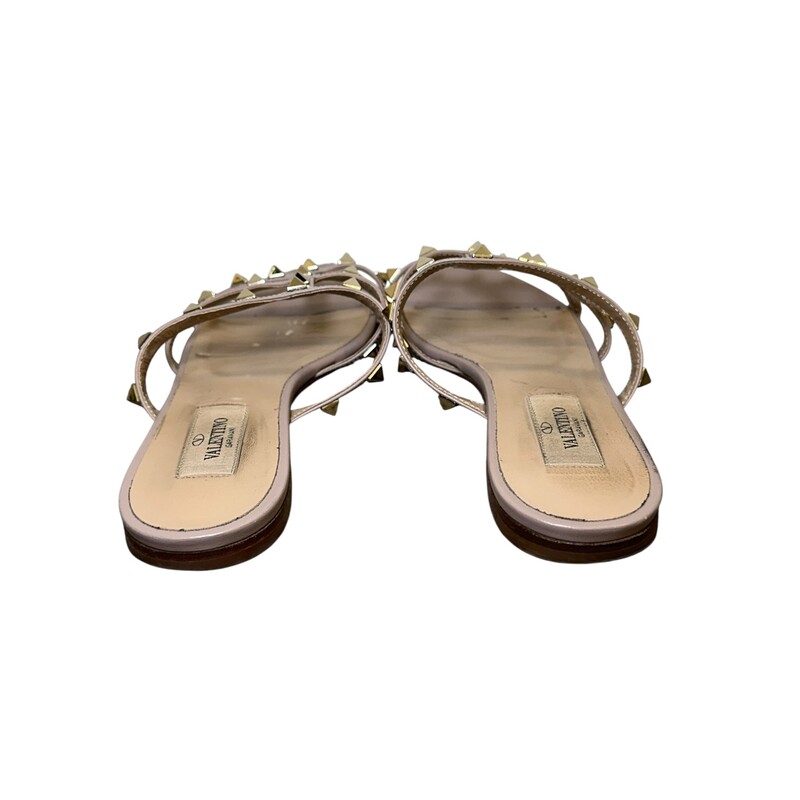 Valentino Rockstud Sandals Rose<br />
<br />
Size 35<br />
<br />
Code: DZ C492<br />
<br />
In good condition. Wear to the leather throughout the shoes.<br />
<br />
Comes with the original dust bag and box.