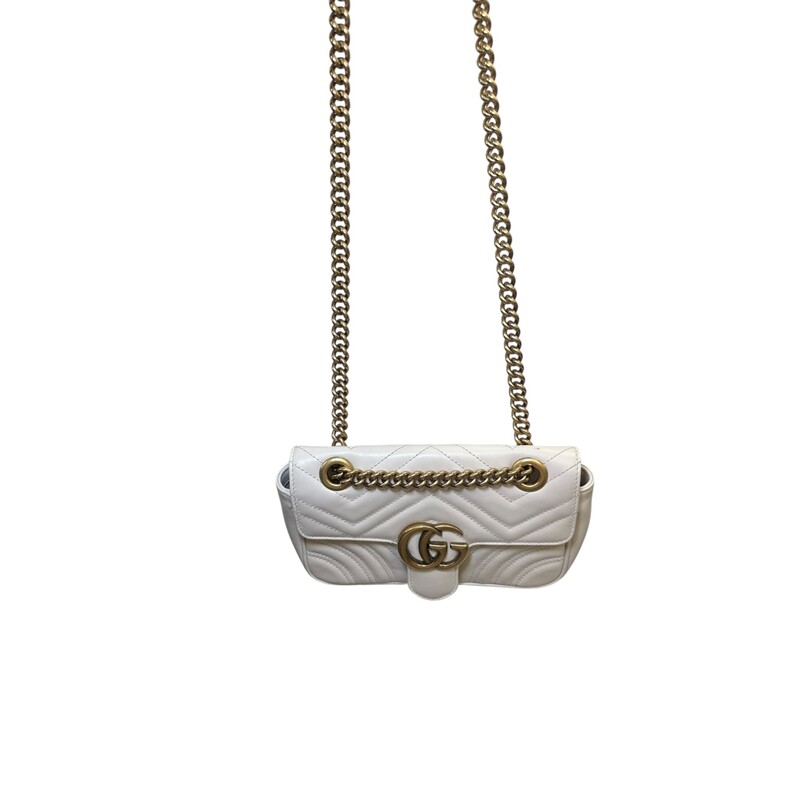 Gucci Marmont Leather Shoulder Chain Bag<br />
<br />
Style Code:446744 520981<br />
<br />
Dimensions:8.5 W x 5 H x 2.5 D inches<br />
<br />
In very good condition. Some marks inside the interior.<br />
<br />
Does not come with original dust bag or box.