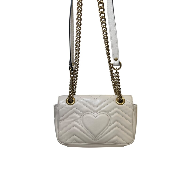 Gucci Marmont Leather Shoulder Chain Bag<br />
<br />
Style Code:446744 520981<br />
<br />
Dimensions:8.5 W x 5 H x 2.5 D inches<br />
<br />
In very good condition. Some marks inside the interior.<br />
<br />
Does not come with original dust bag or box.
