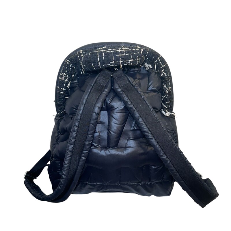 Chanel Nylon Doudoune BLack Logo Tweed Backpack<br />
<br />
Serial Code:2654947<br />
<br />
Dimensions: 15 L X 12 H inches<br />
<br />
In very good condition. Some minor interior marks and some scratching of the hardware.<br />
<br />
Does not come with original dust bag or box.