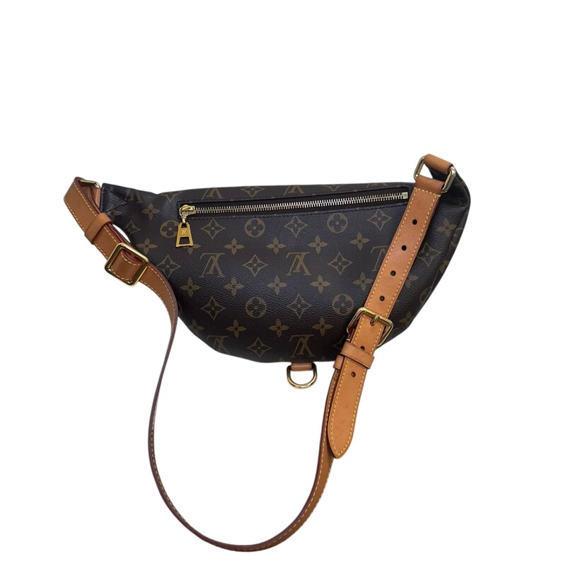 Louis Vuitton Monogram BumBag<br />
<br />
Date Code: MI4188<br />
<br />
Dimensions:<br />
Strap Length: 35 inches<br />
Height: 6.75 inches<br />
Width: 14.75 inches<br />
Depth: 5.25 inches<br />
<br />
In very good condition. Natural patina of the wallet and minor hardware scratches